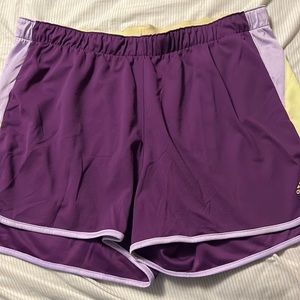Purple and yellow Adidas athletic shorts